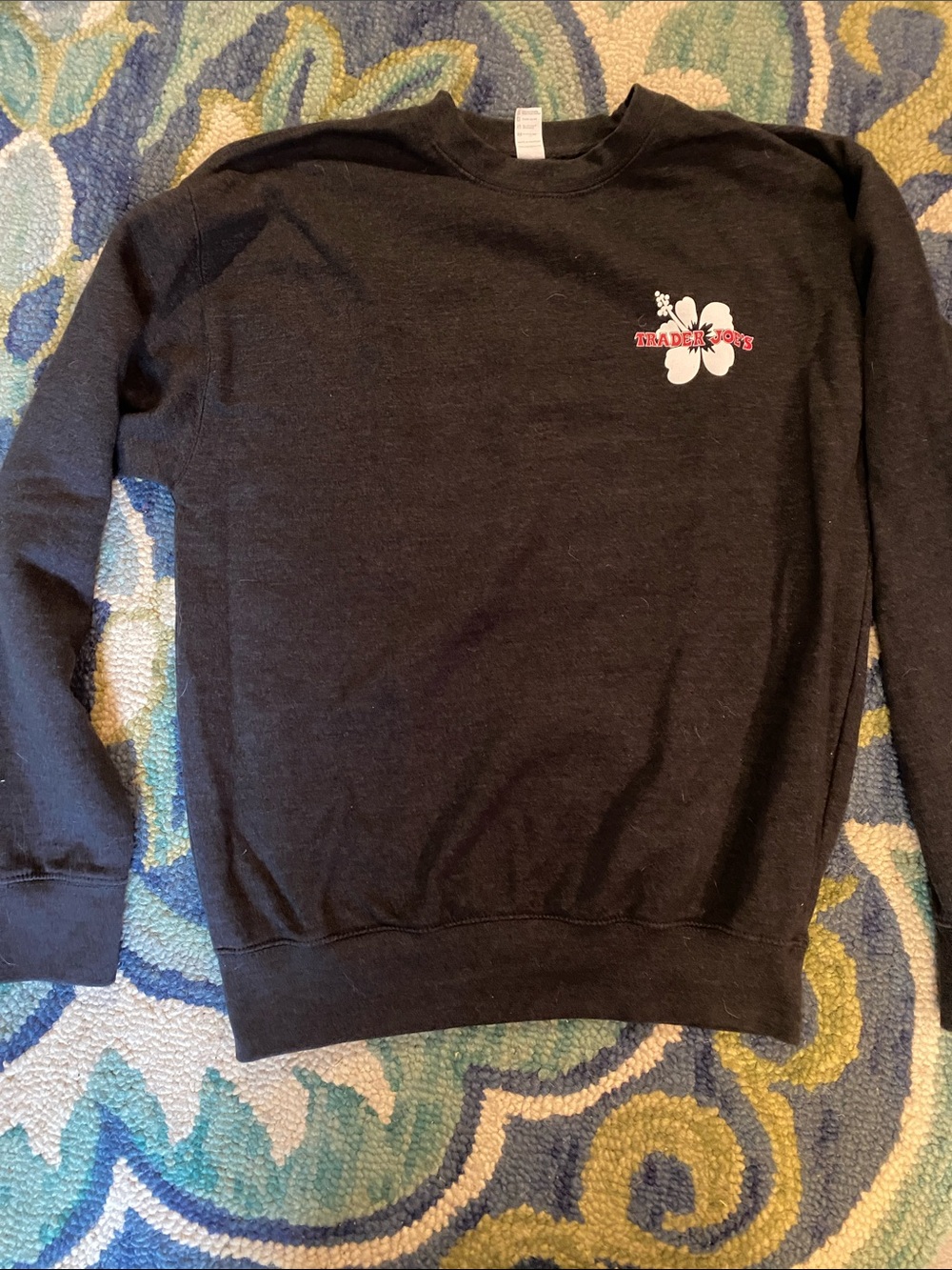 Trader Joe’s/— Black Crewneck with White Hibiscus and Red Accent fits small